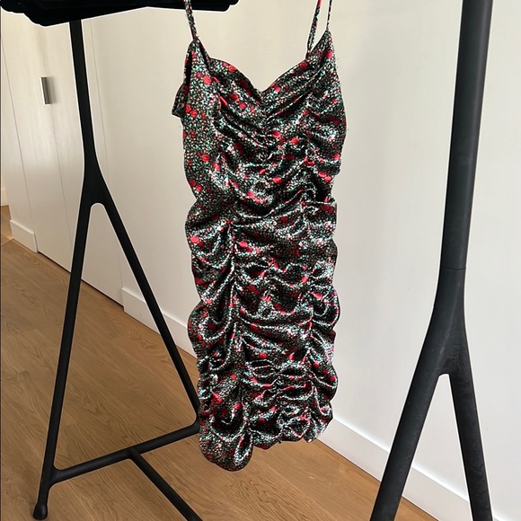 Urban Outfitters 
shell: 100% polyester 
lining: 92% nylon 8% elastane - Picture 1 of 3